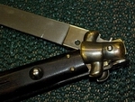 COLTELLO  A SCATTO ROTAZIONE FASCETTA PER SBLOCCO 5.jpg